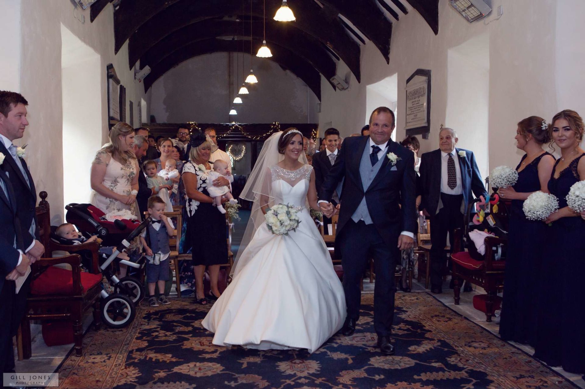 the bride walking towards the groom