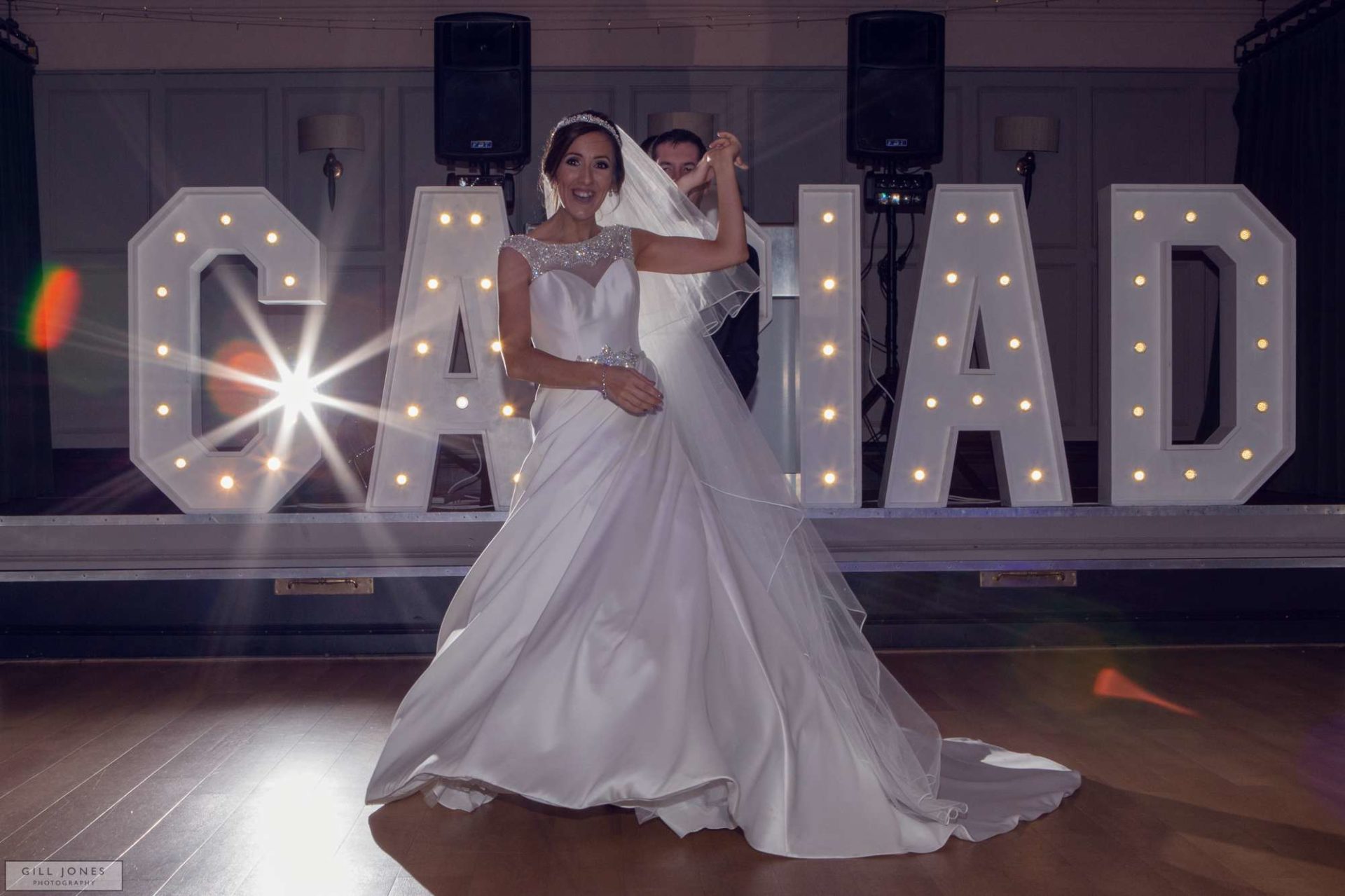 the bride and groom on the dancefloor