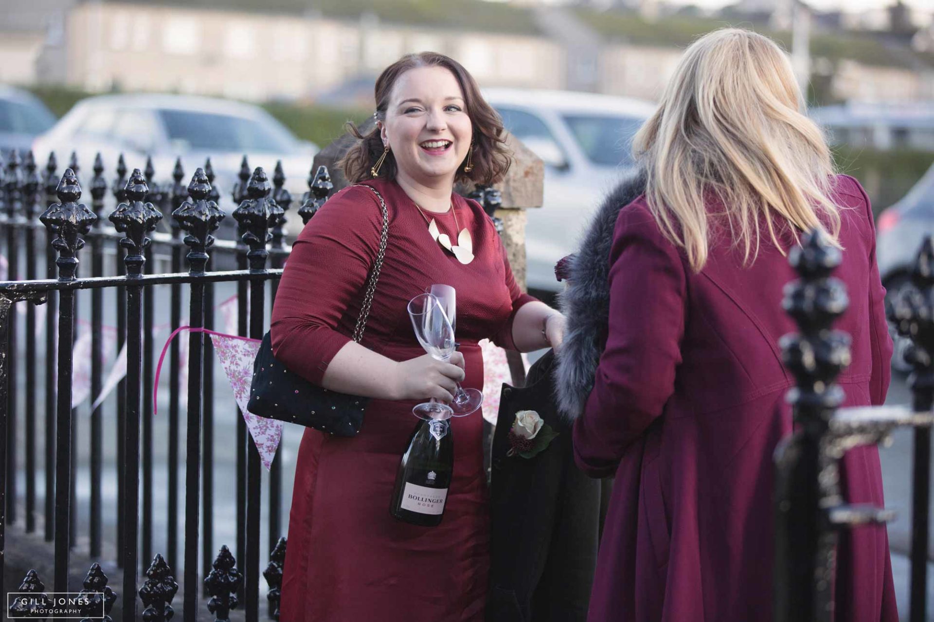 a guest holding a bottle of champagne