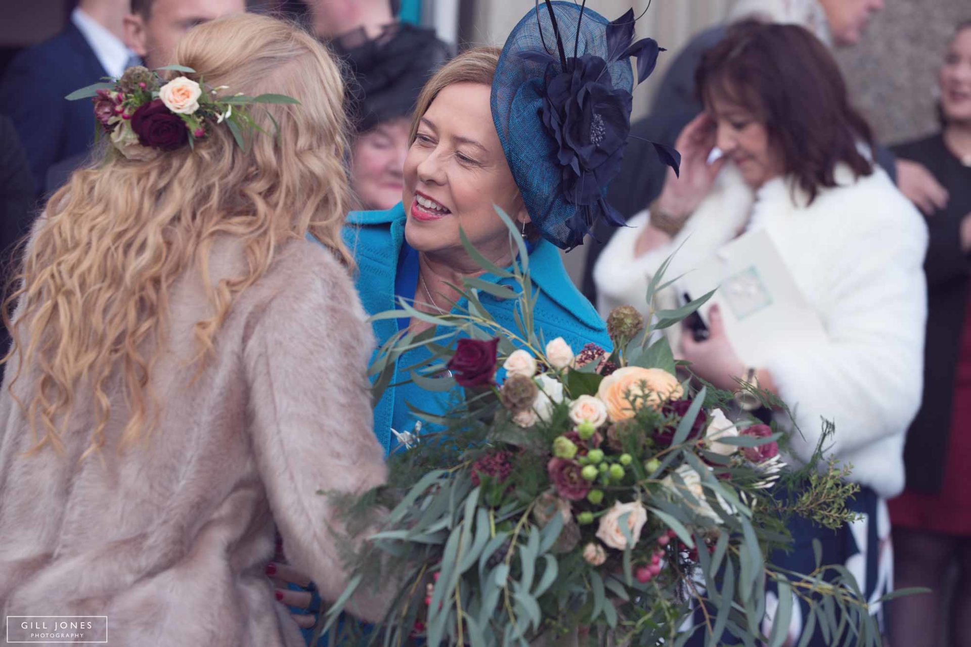 a guests hugging the bride