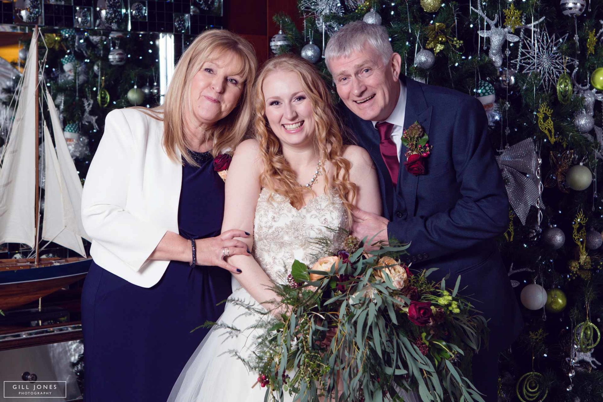 the bride with her mum and dad