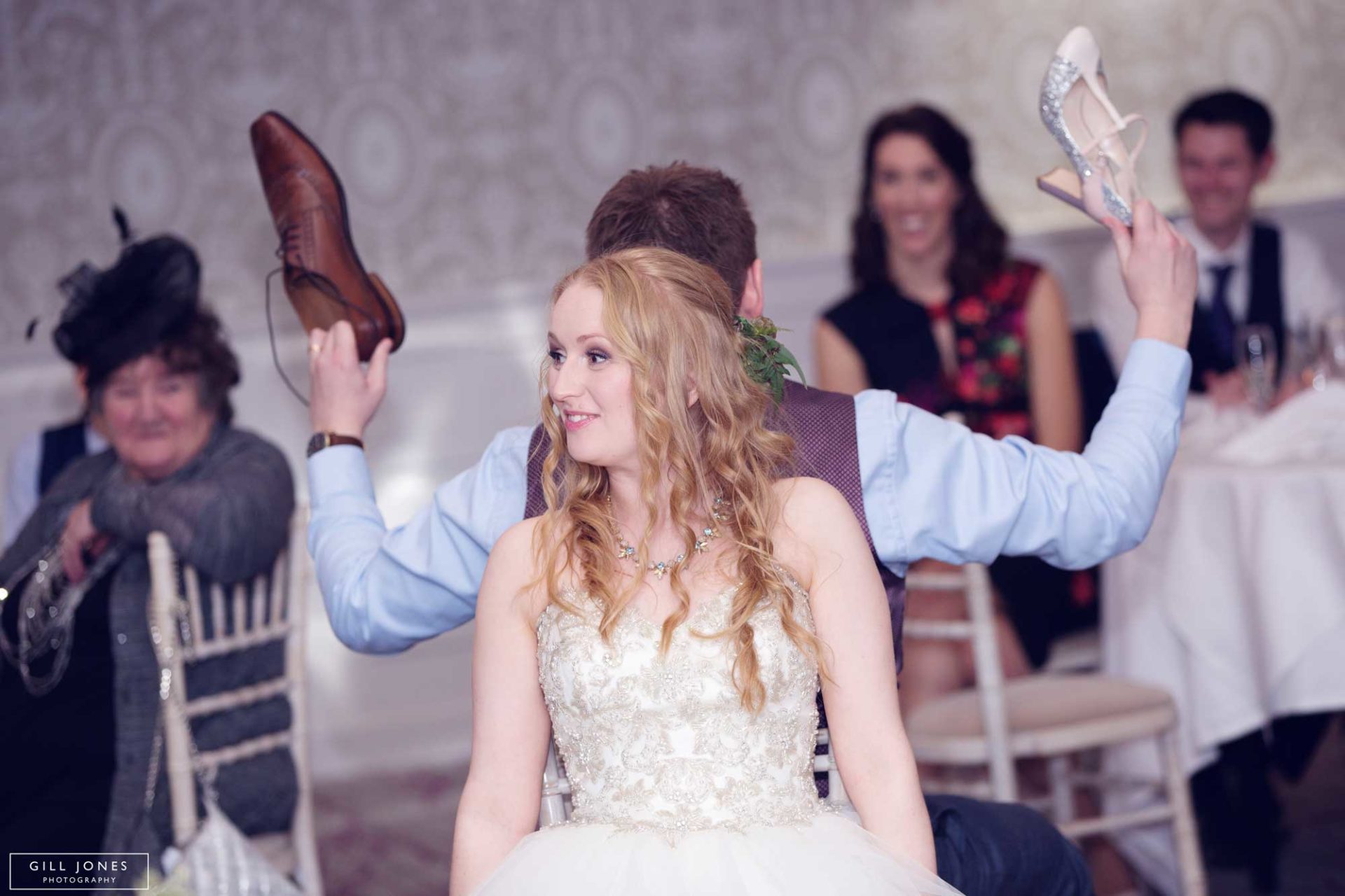 the bride and groom play parlour games