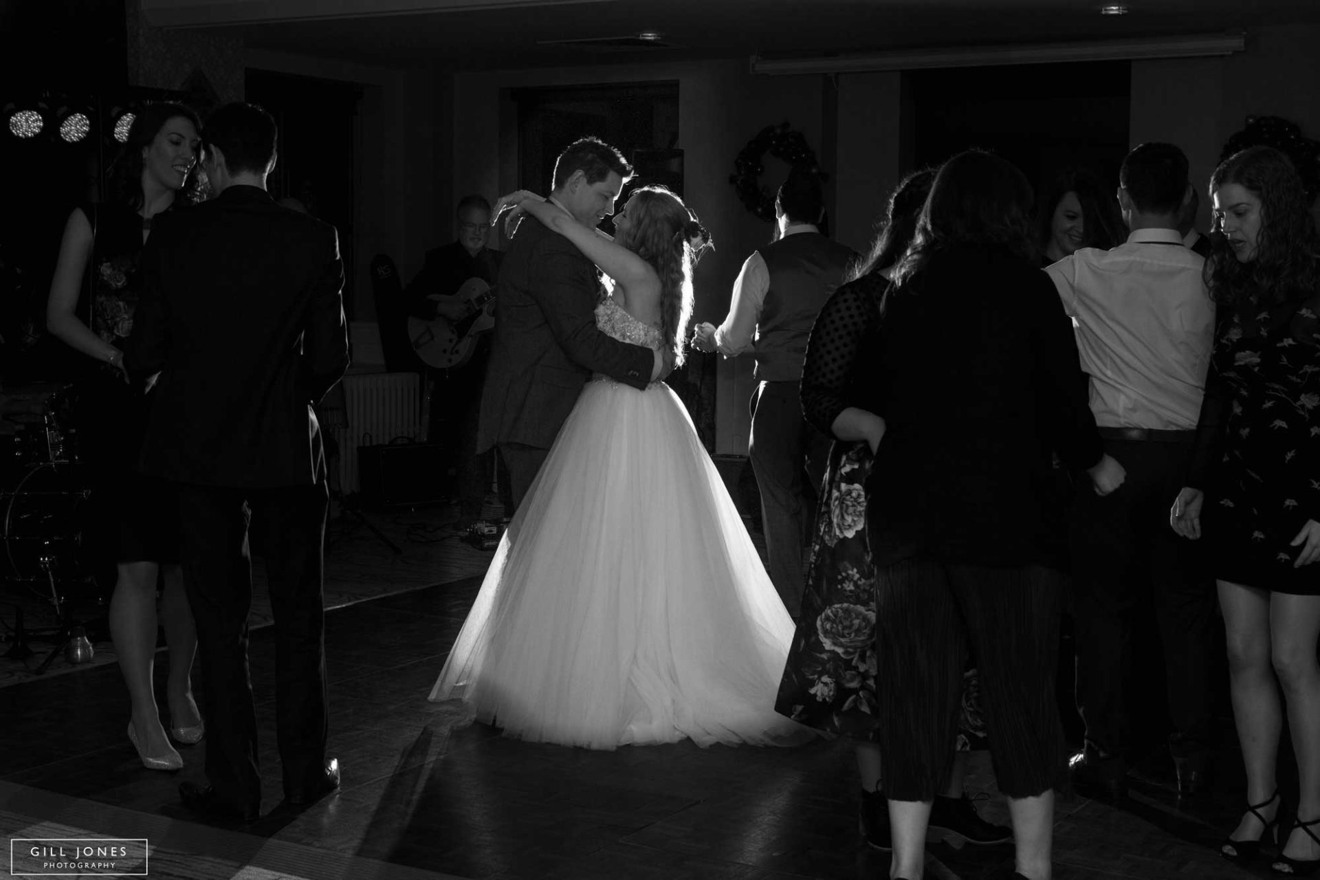 the bride and groom on the dancefloor