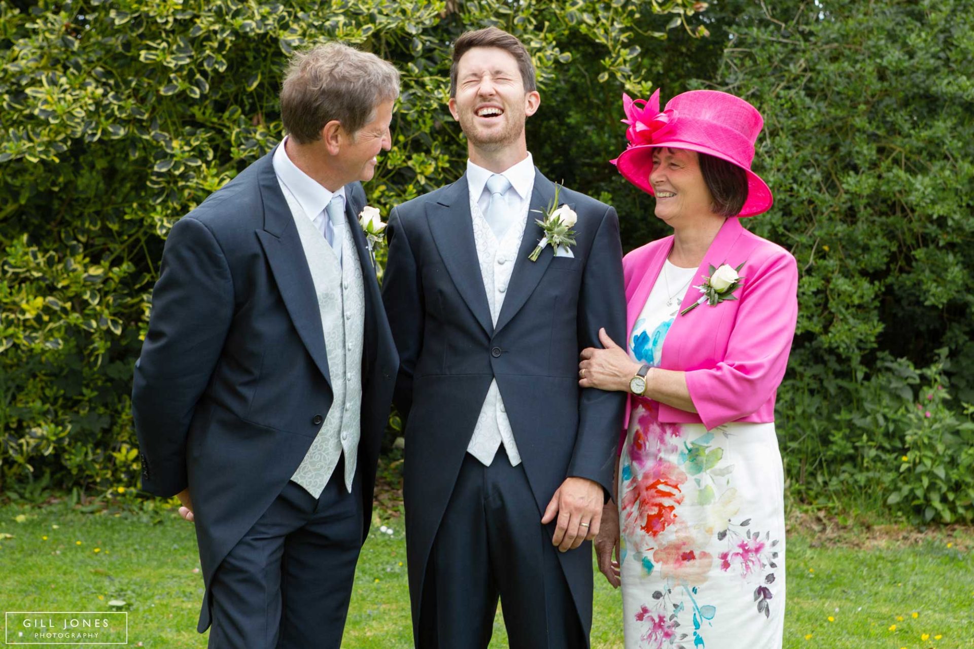 the groom with his mum and dad 