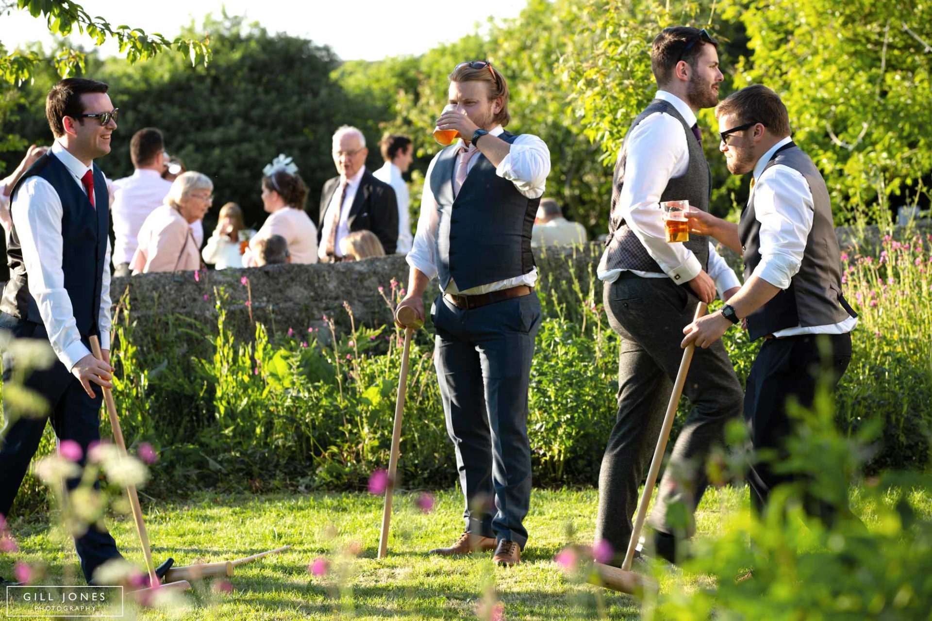 guests playing croquet