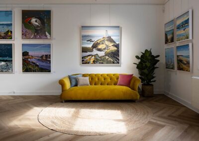 the interior of a gallery with a window reflection on the floor by Anglesey commercial photographer Gill Jones photography