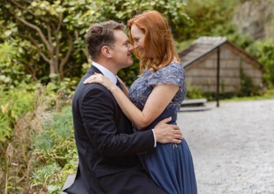 a couple caress and look into each other's eyes by Anglesey elopement photographer Gill Jones Photography